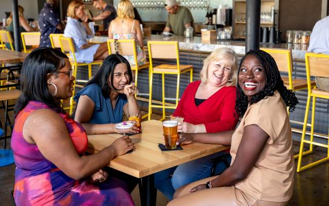 A group of ladies enjoying drinks and each other's company at Fayetteville's Haymount Truck Stop