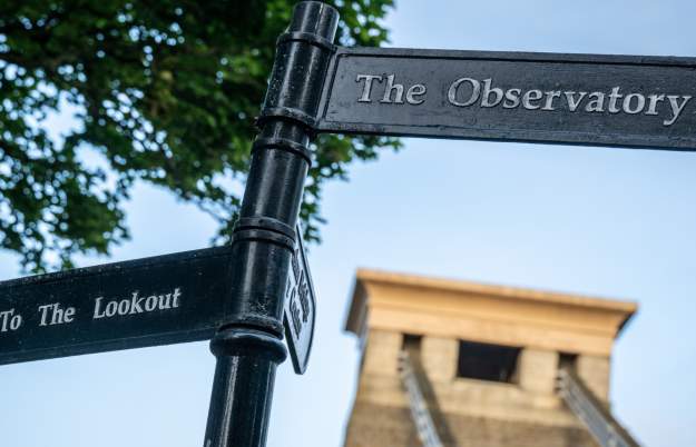 A sign at the Clifton Suspension Bridge showing directions for The Lookout and The Observatory - Credit Lee Pullen Photography for Clifton Suspension Bridge Trust
