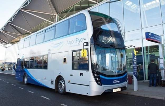 A grey double decker bus outside Bristol Airport