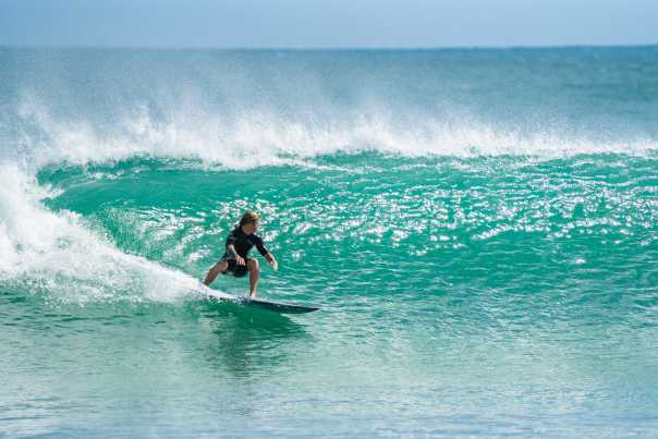 Cocoa Beach - surfer riding wave