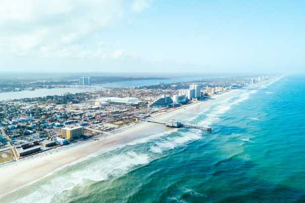 aerial view of daytona beach that includes the city and ocean
