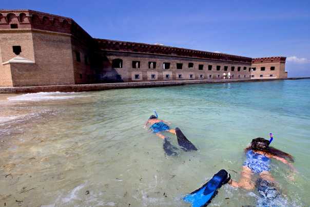 Children snorkeling in the ocean at Dry Tortugas National Park Key West