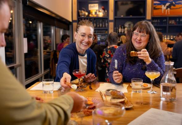 Two women dining at Seven Acres Dairy