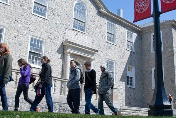 Group of college students walking on campus at Dickinson College