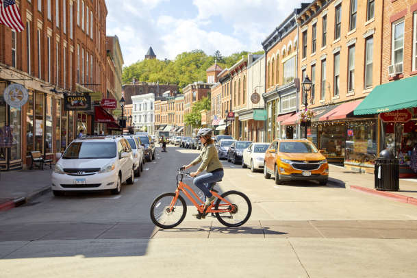 Woman riding bike on Main Street