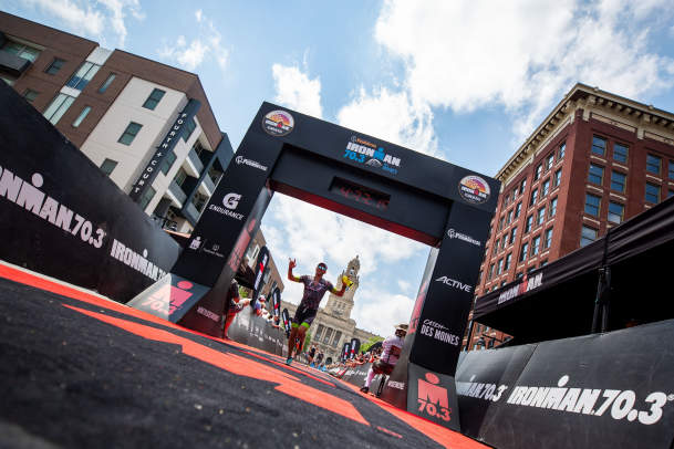 Ironman runner crossing the finish line