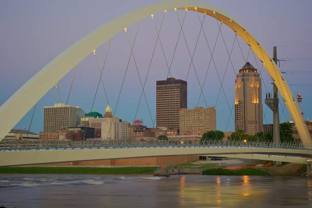 Iowa Women of Achievement Bridge wth downtown skyline at sunrise