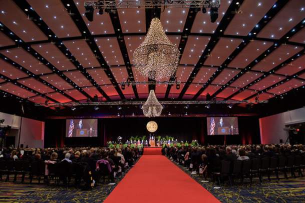 Attendees in the ballroom of the Iowa Events Center