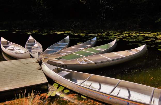 Canoes at Lake Cleawox on the Oregon Coast by Bonnie Melville