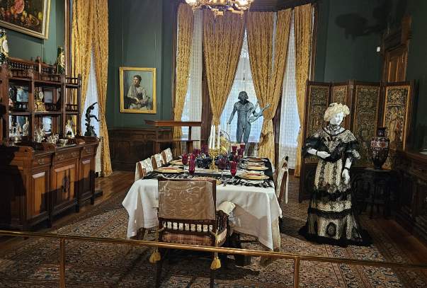 The ornated Gilded Age dining room at Glenview Mansion.