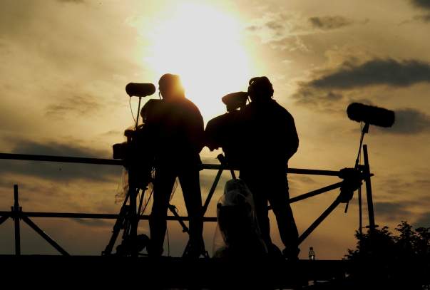 Film crew at sunset