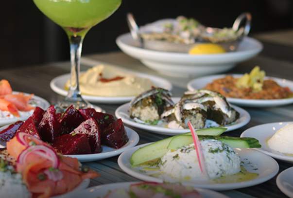 plates of food and drink on table