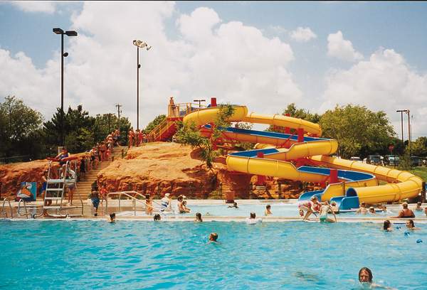 people enjoying water park and slides