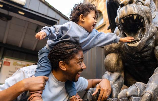 A father and son at Wookey Hole in Wells, near Bristol - credit Wookey Hole