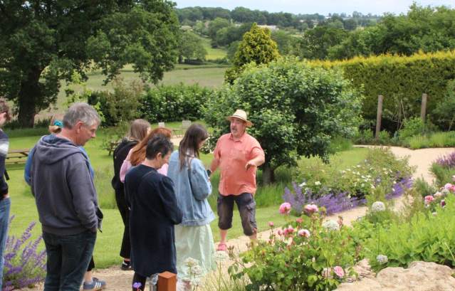 People inthe garden at The Pony Chew Valley in North Somerset near Bristol - credit Visit West