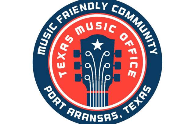A red and blue seal reads Music Friendly Community, Texas Music Office, Port Aransas, Texas. There is a guitar outline in the center of the seal.