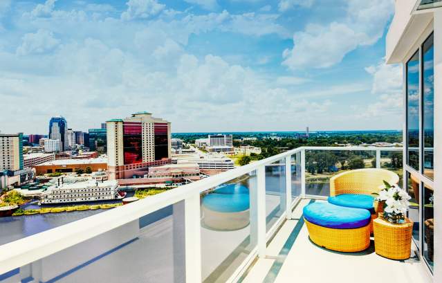 Margaritaville Resort Casino balcony overlooking Red River and riverfront