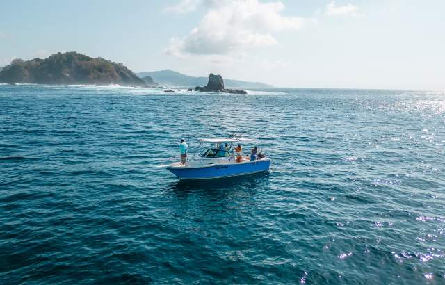 Beautiful blue sea with boat sailing in the Gulf of Montijo in Veraguas