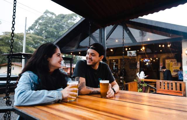 Friends enjoying some beers on the terraces of Boquete Brewing Company at Boquete
