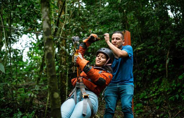 Woman doing zip line at Volcan, Chiriqui