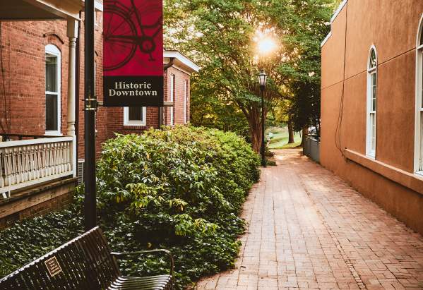 Alleyway With Bench And Bushes In Downtown Davidson, NC