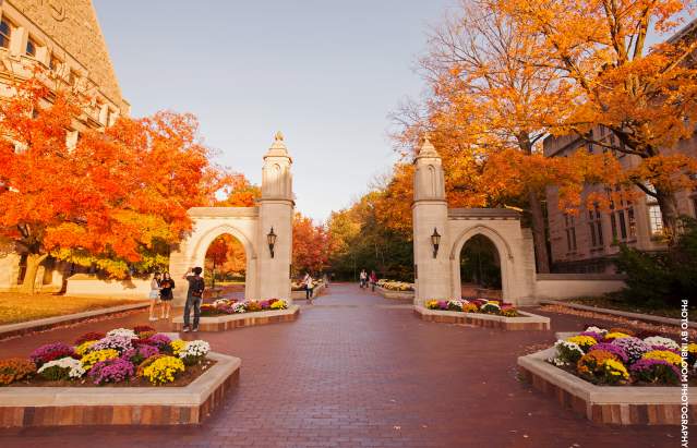 The Sample Gates at Indiana University surrounded by fall foliage
