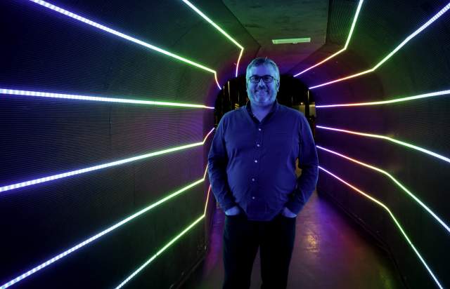 Simon Jackson stood in the light up tunnel to 42s nightclub