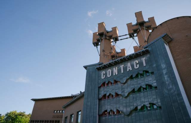 External view of Contact Theatre with CONTACT sign