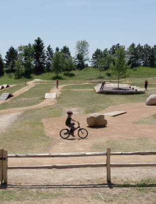 Child biking at bike park