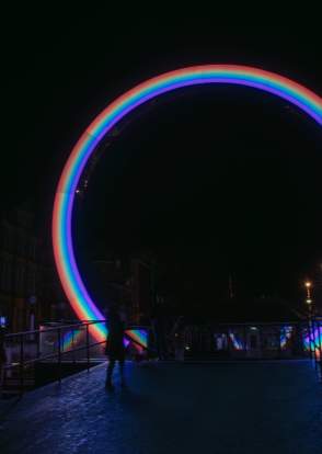 Image shows ARC installation from Lightport - a 10ft rainbow archway on Lord Street