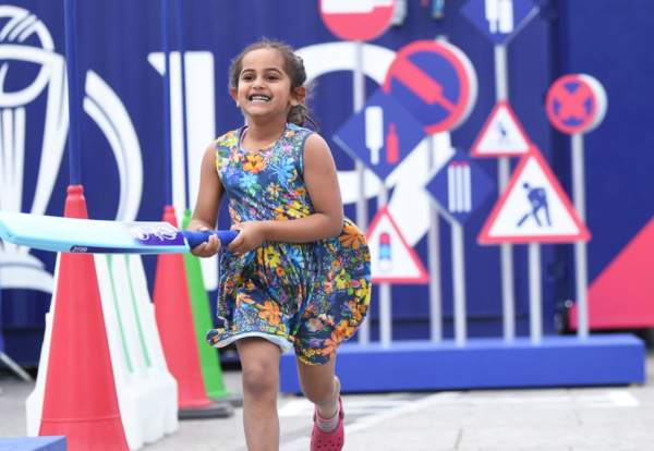 Girl playing cricket activities - credit ICC