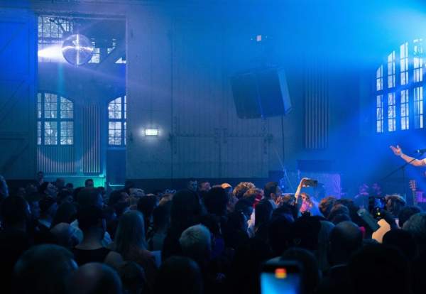 Crowd in dark event room