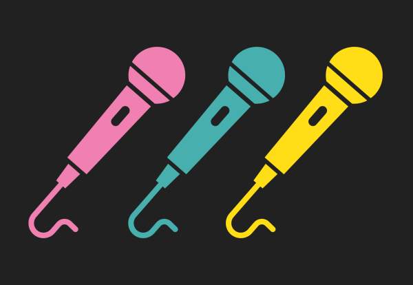 Coloured microphones on a black background