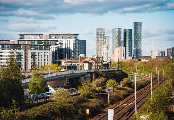 Skyline with train tracks leading into city centre with skyscrapers