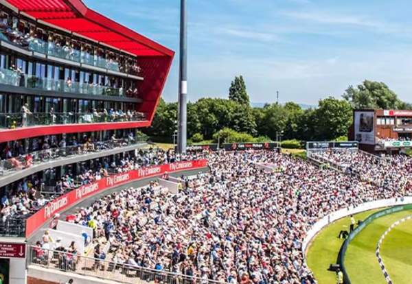 Cricket stand with people watching cricket match
