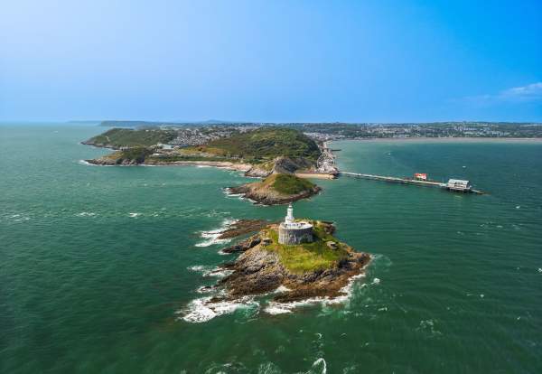 Mumbles drone low altitude Lighthouse towards Mumbles