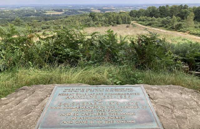 A view over a plaque commemorating winnie the pooh in the high weald