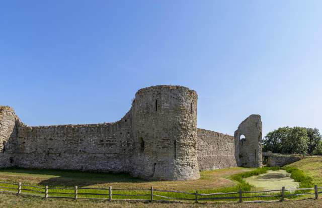 A wide shot of Pevensey castle in the sunshine