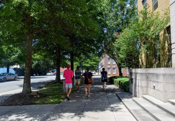Group Of People Walking Around Downtown Cornelius, NC