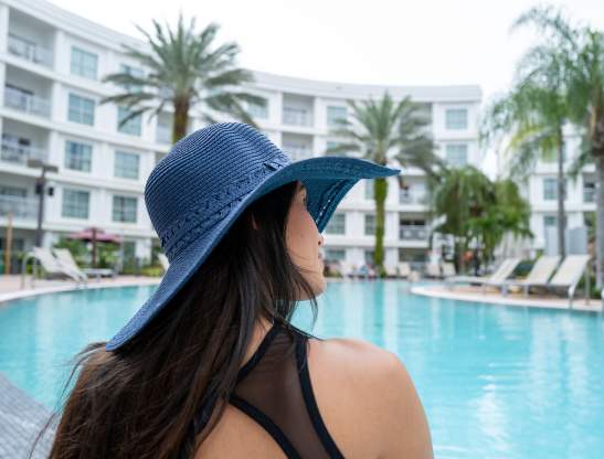 Woman at pool at Melia Orlando Celebration