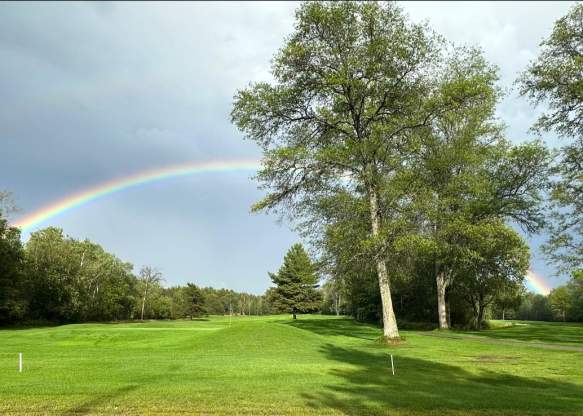 Picture of the Patriot Golf course with a rainbow
