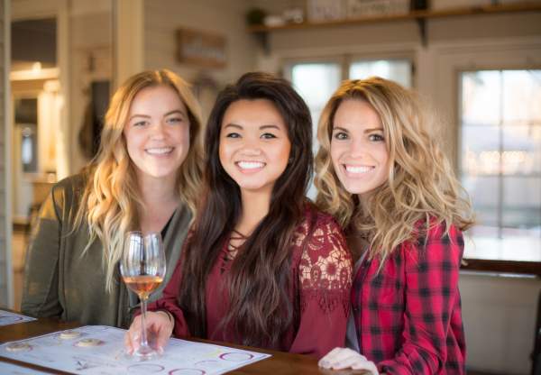Friends drinking wine at WaterTower Winery