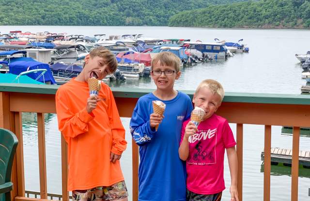 a trio of young boys enjoying ice cream at the Lake Raystown Resort Marina