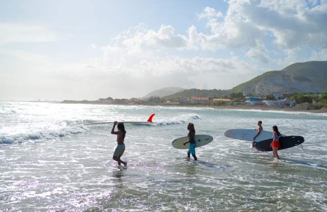 Surfing at Jamnesia - Kingston - Community Based Tourism