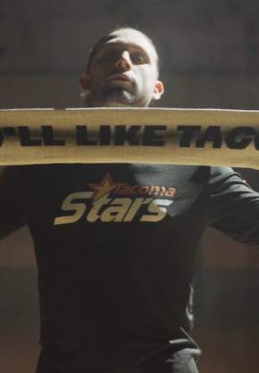 Soccer player showing off FIFA World Cup Tacoma Scarf