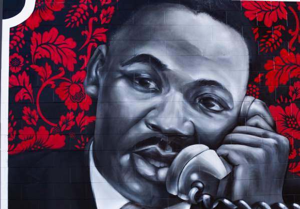 Close up of mural showing MLK talking on a phone