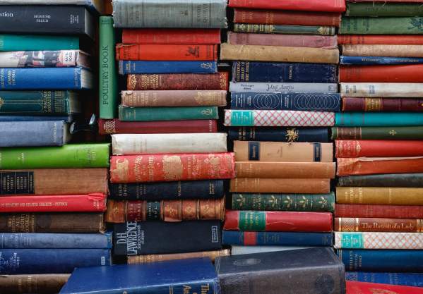 Stacks of colorful books grouped together