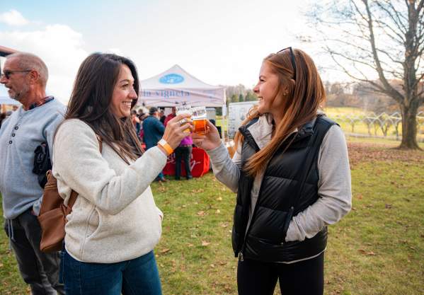 People raise a glass to Bonfires, Barrels & Brews