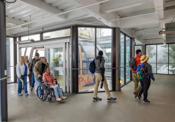 Guest in wheelchair enjoys a ride on the Palm Springs Aerial Tramway