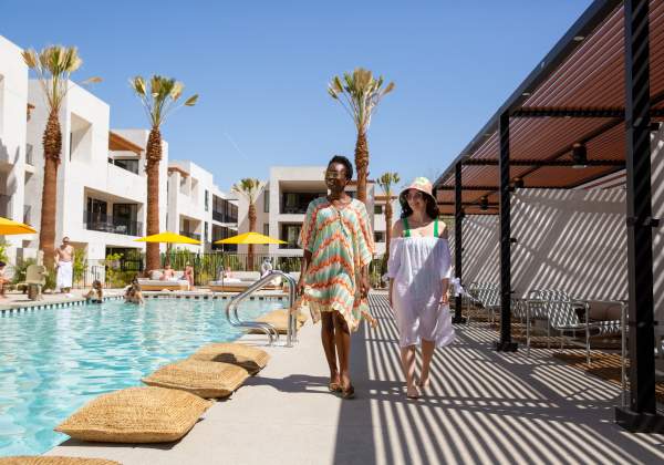 Two women poolside at the Drift Hotel